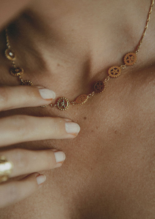 Collier Canang 9 fleurs