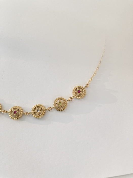 Collier Canang 9 fleurs